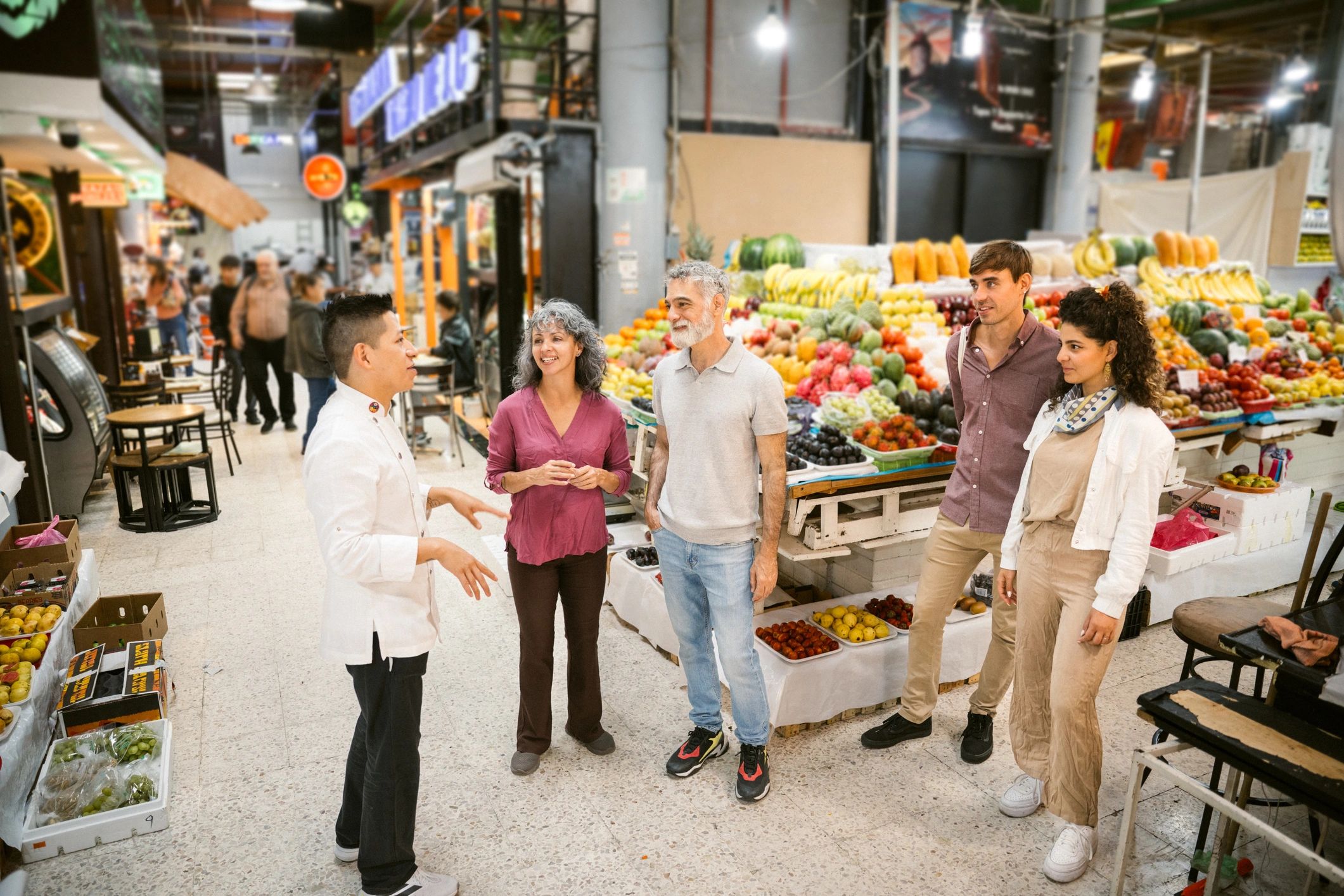 Travelers exploring a vibrant local market