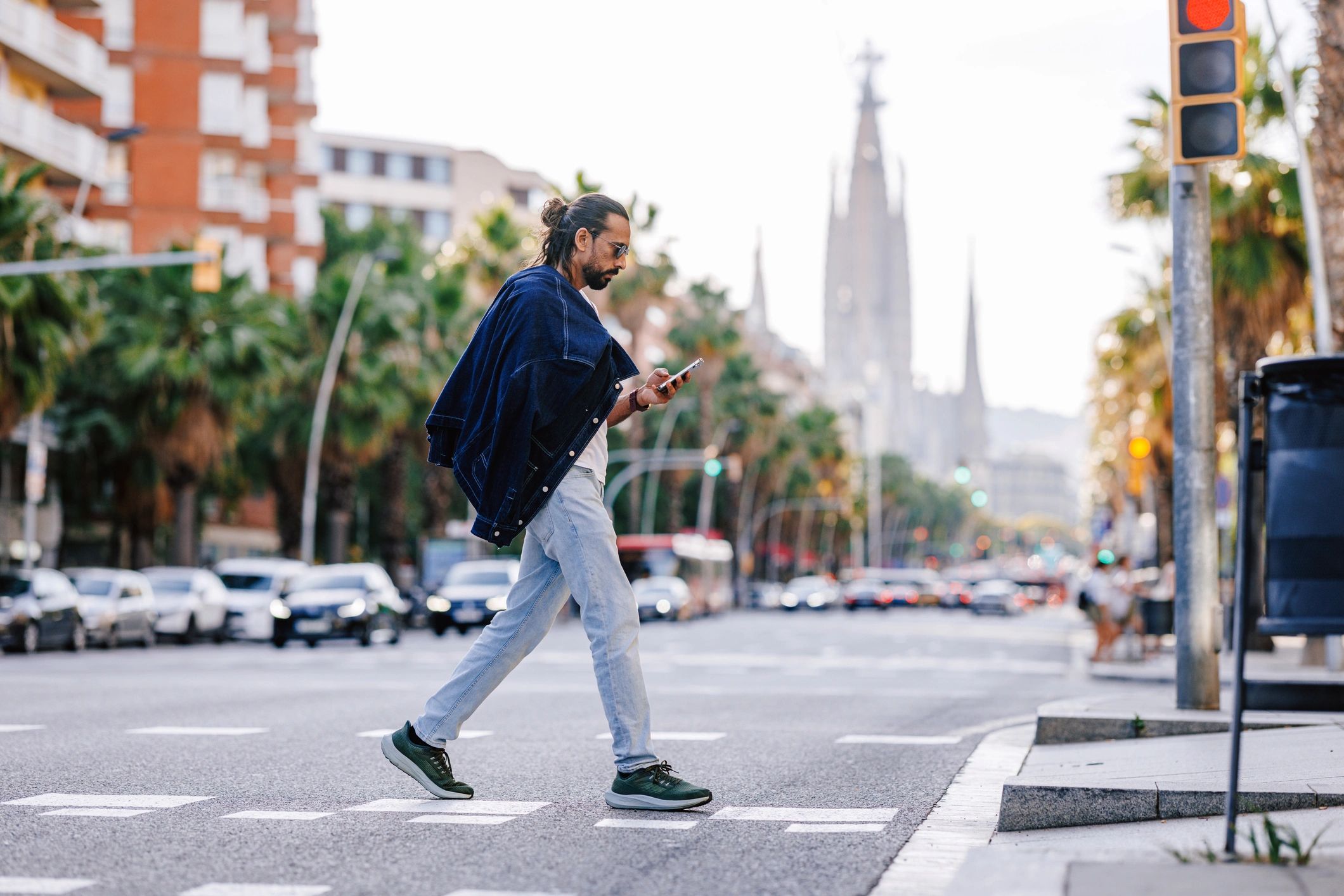 Traveler walking through a vibrant city street